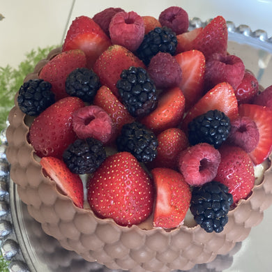 Bowl of chocolate with berries